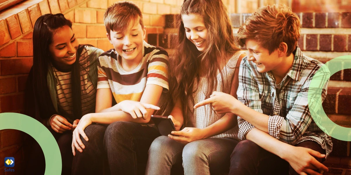 teens smiling sitting on staircase with their phones