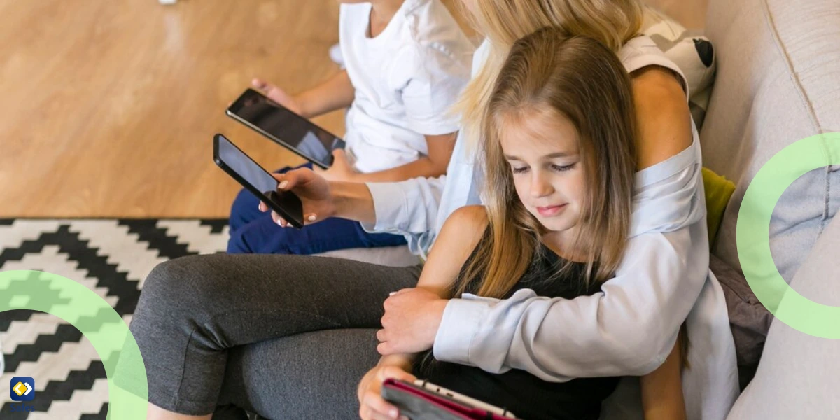 mother and her two children using mobile devices together