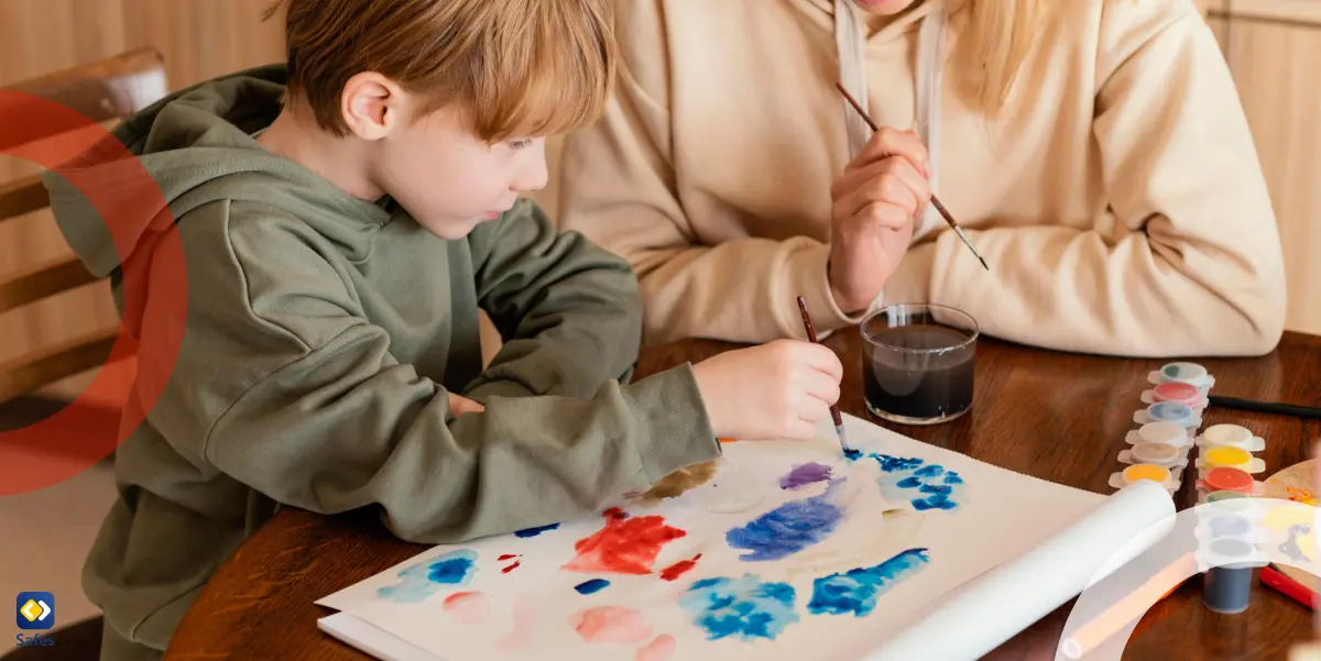 mother and son painting together