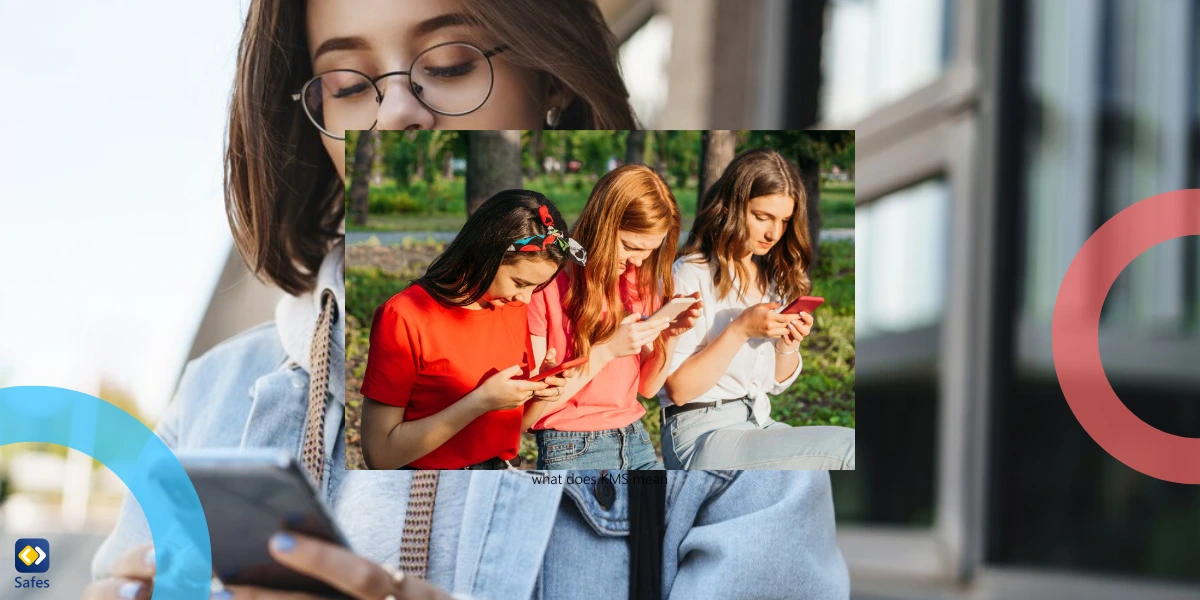 three teen girls using their smartphones in the park