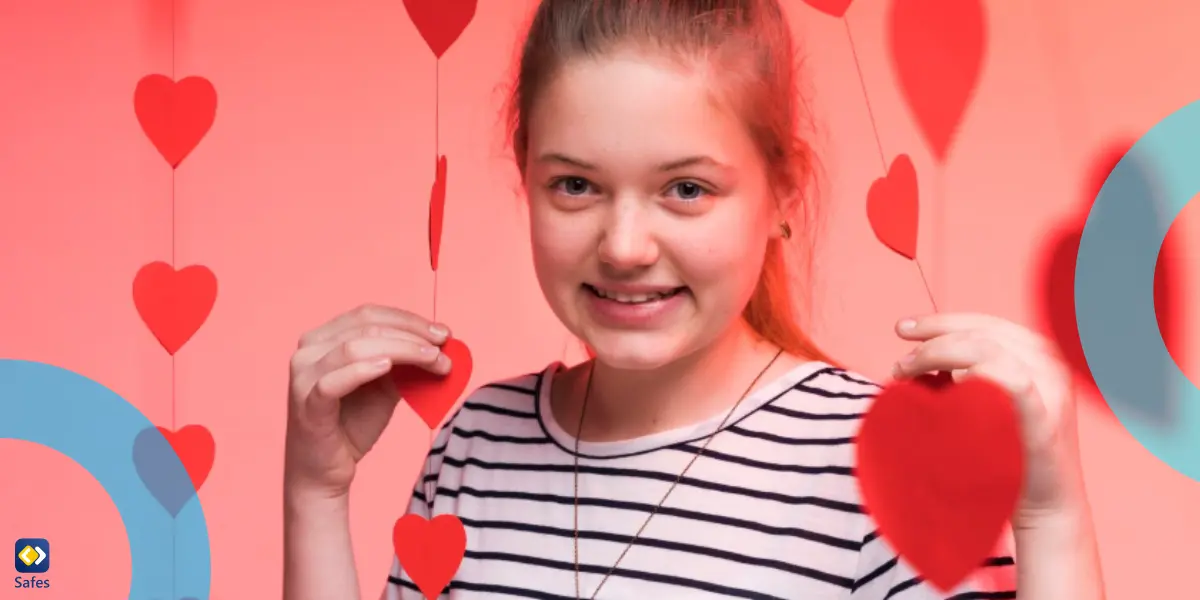 young teen girl posing with hearts